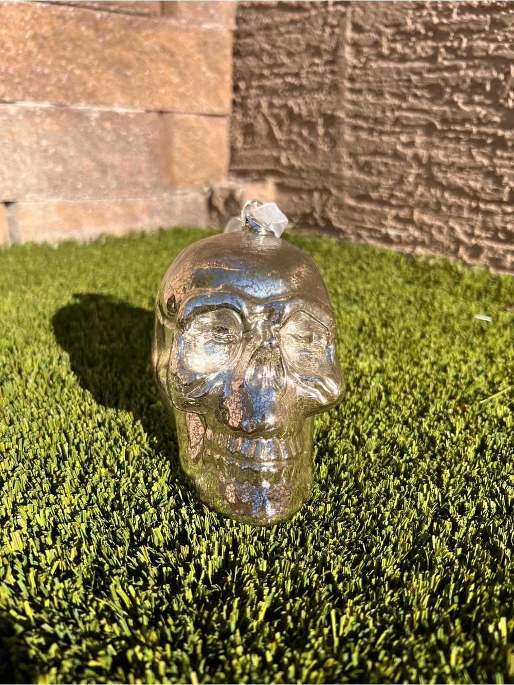 Mirrored glass skull with White Ribbon